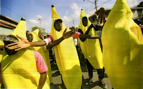 Haiti men dressed as bananas supporting presidential candidate Jovenel Moise.